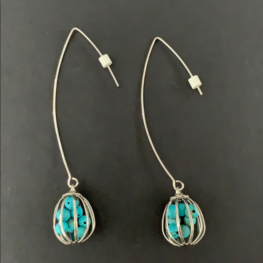 Caged beads long earrings
